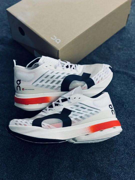 ON CLOUDBOOM STRIKE WHITE ORANGE