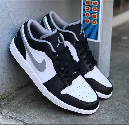NIK.E AIR JORDAN 1 LOW PARTICLE GREY
