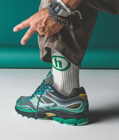 SAUCONY PROGRID OMNI 9 GLOWACONSTRICTOR