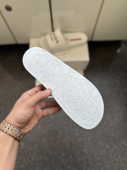 Praada Logo embossed white
