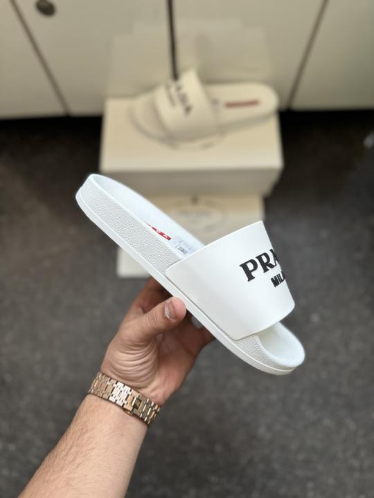 Praada Logo embossed white