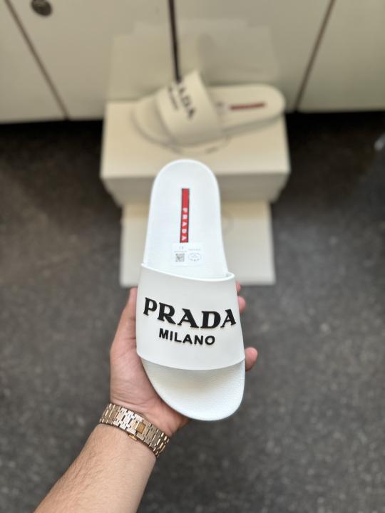Praada Logo embossed white