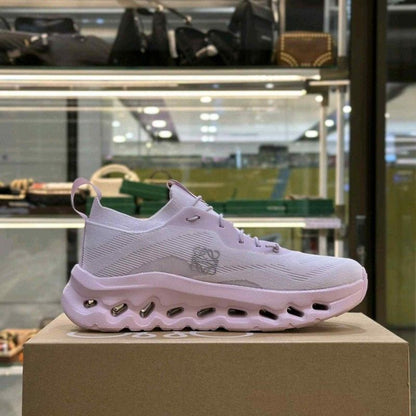 On Cloudtilt running Loewe Pale Pink for her