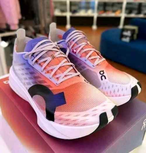 On Cloudboom Strike White Flame with cloud extra insole