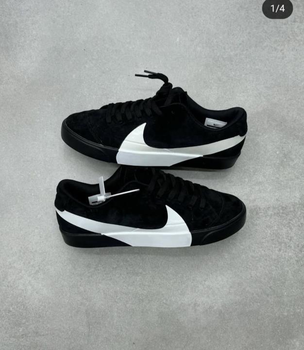 Nik.e Blazer City Low LX black and white sneakers.