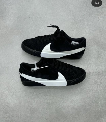 Nik.e Blazer City Low LX black and white sneakers.