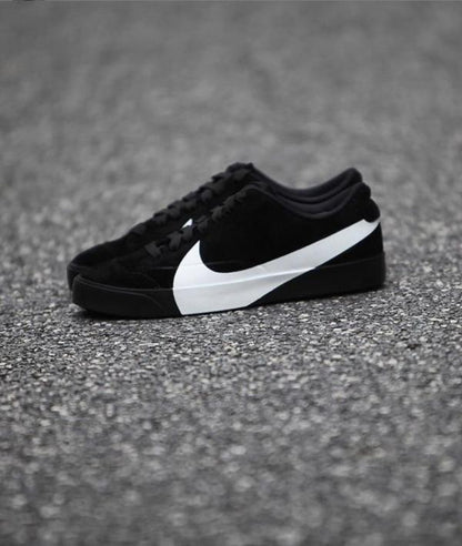 Nik.e Blazer City Low LX black and white sneakers.