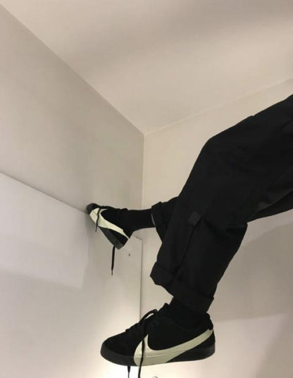 Nik.e Blazer City Low LX black and white sneakers.
