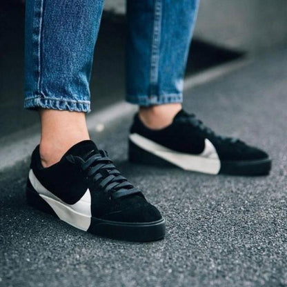 Nik.e Blazer City Low LX black and white sneakers.