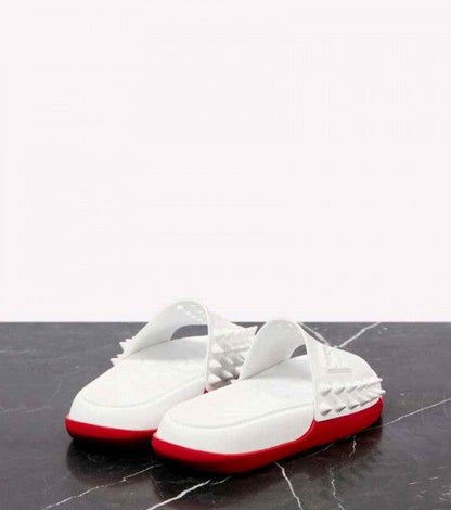 CHRISTIAN .... LOUBOUTIN take it easy slides white