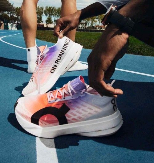 ON RUNNING CLOUD BOOM WHITE ORANGE