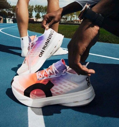 ON RUNNING CLOUD BOOM WHITE ORANGE