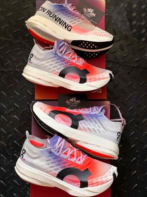 ON RUNNING CLOUD BOOM WHITE ORANGE