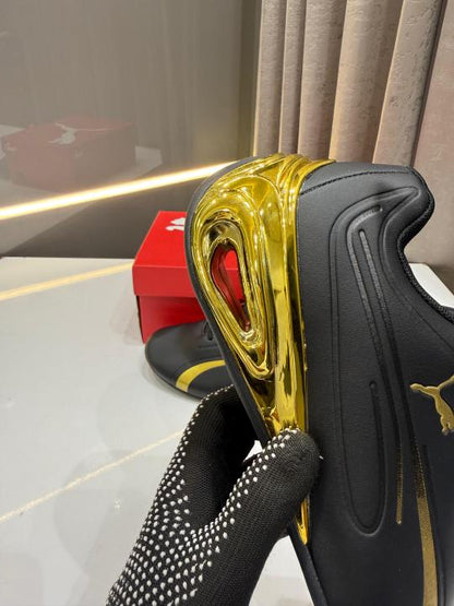 PUM_A SUPER GT BLACK GOLD FIX