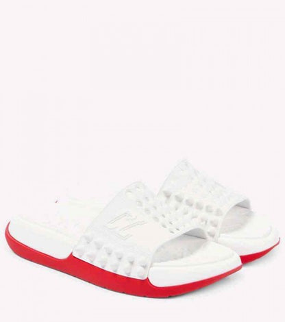 CHRISTIAN .... LOUBOUTIN take it easy slides white