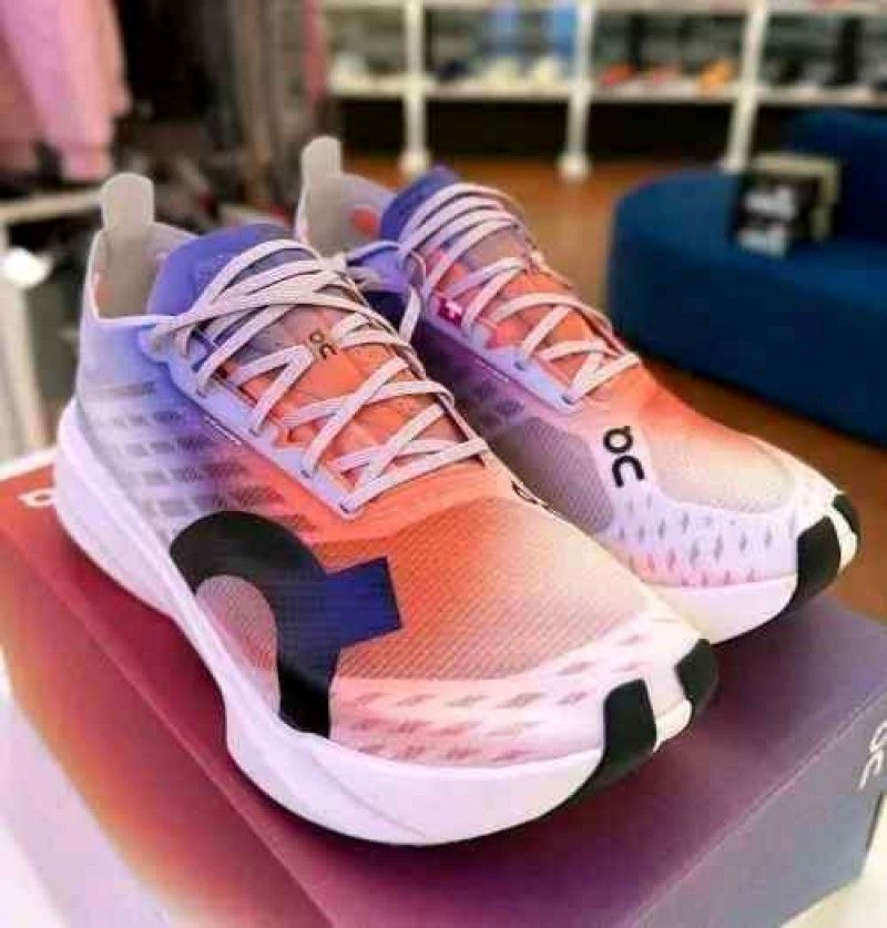 On Cloudboom Strike White Flame with cloud extra insole
